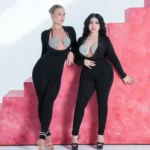 A jumpsuit with an open design and a shiny silver bustier